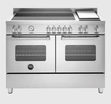 Stainless steel kitchen range with dual ovens and cooktop on a white background