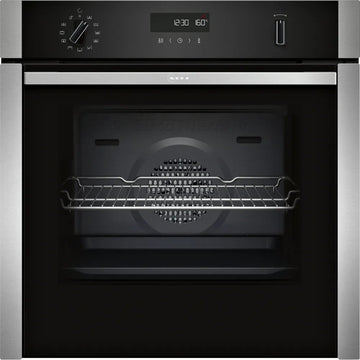 Neff slide and hide oven with digital display and control panel on a black background

