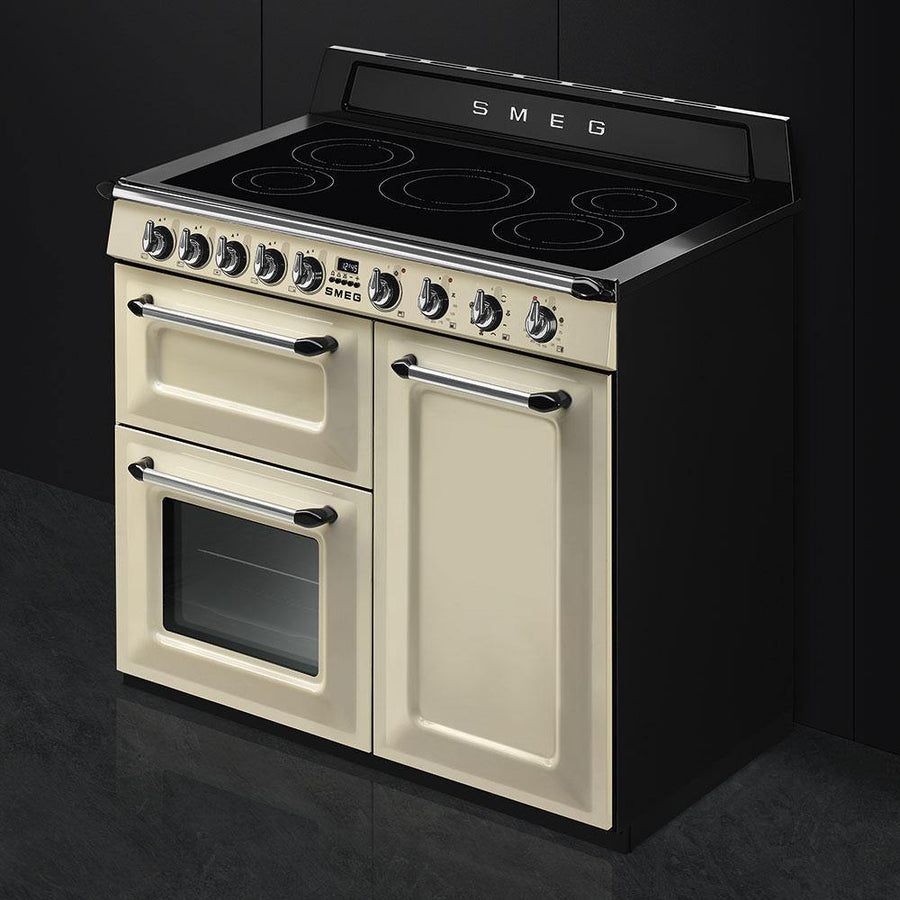 Smeg TR103ip 100cm Victoria traditional 3 cavity range cooker with induction hob in cream. 